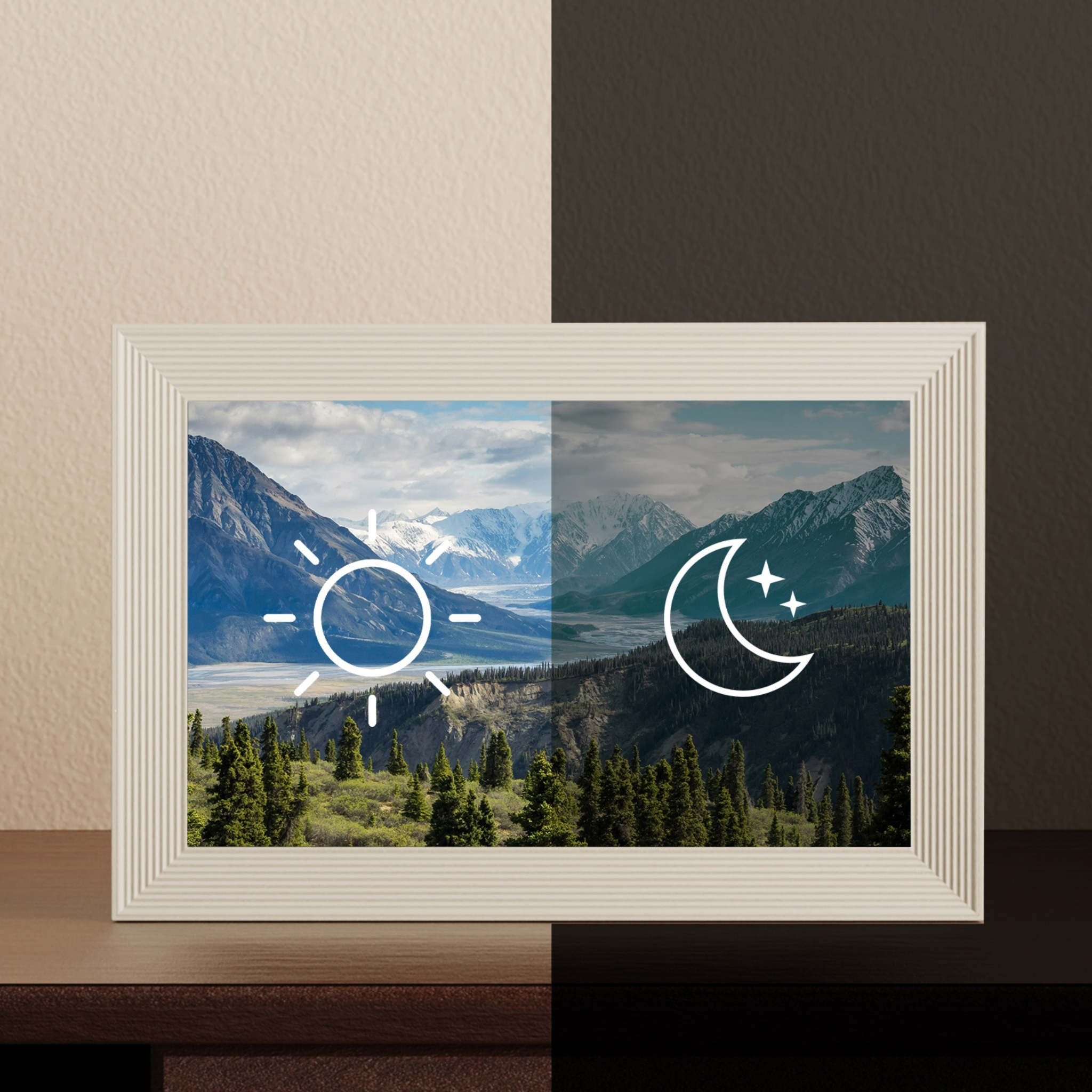 Framed artwork with mountain landscape and sun/moon icons on a neutral background